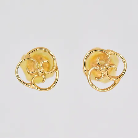 Ett par örhängen, Ø 6,7mm, plastdetaljer på stopparna, 18K Vikt: 0,8 g