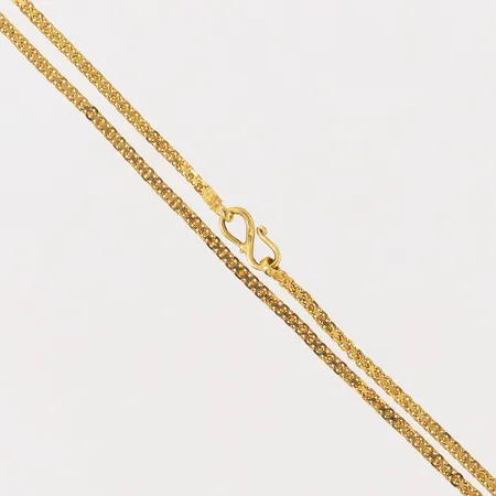 Kedja X-länk, längd 47cm, bredd 1,8mm, ojämn/bucklig, 18K.  Vikt: 4,2 g