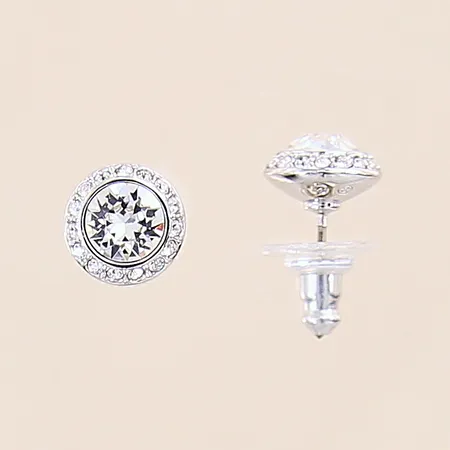 Ett par örhängen med vita stenar, Ø10mm, Swarovski, snurrebussar i plast, silverfärgad metall