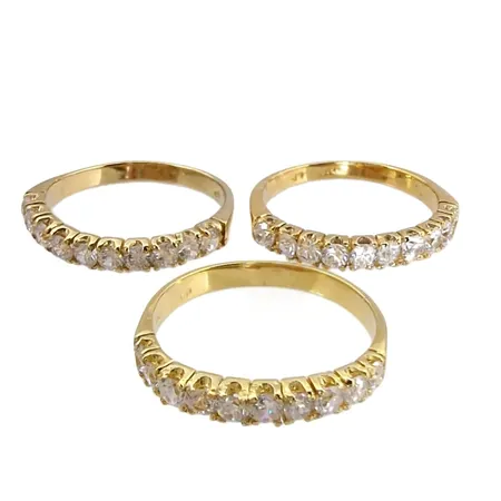 Ringar, 3 stycken, OANVÄNDA, silver 835/1000, förgyllda, vita stenar, Ø18¾-19,0 mm, bredd 2,5-3,5 mm, fint skick med kraftig förgyllning, stenar utan anmärkning, tillverkarstämpel LP, nyskick Vikt: 7 g