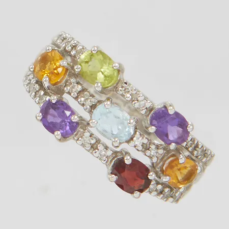 Ring, diamanter 22xca0,0025ct, ametister, citriner, granat, peridot och topas, Ø16½, bredd:3,5-9mm, GHA, vitguld, 18K. Vikt: 4,2 g