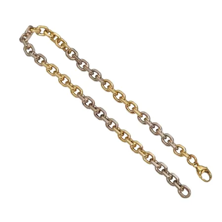 Armband Ankarlänk, 18K guld, tvåfärgad massiv modell, längd 22,0 cm, bredd 5 mm Vikt: 21,4 g