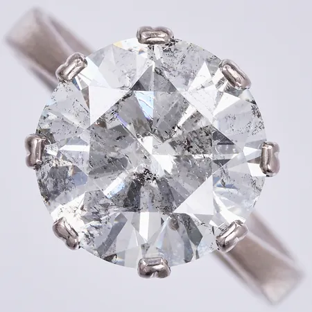Ring med briljantslipad diamant ca1x5,75ct, Tca-ca (L-M) P1-P2, stl: 17½, bredd: ca 3-17mm, vitguld, 18K Vikt: 4,3 g