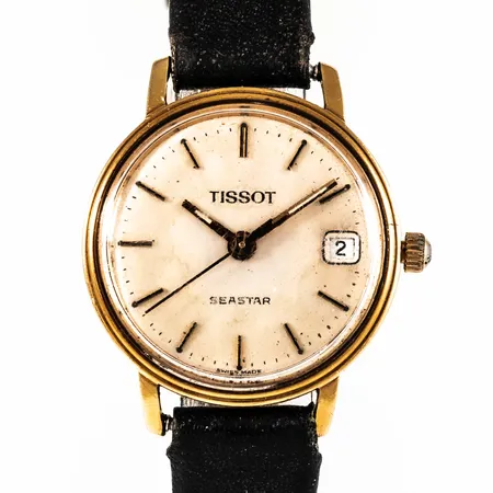 Defekt damur Tissot Seastar 18K med läderband. Boett Ø 22 mm med gravyr. Går ej. Går ej att ställa.