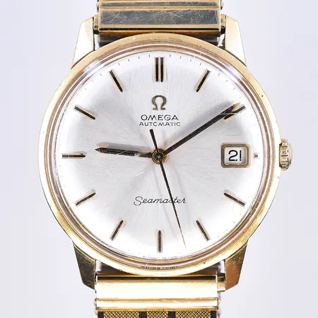 Herrur Omega Seamaster, automat, datum, Ø34 mm, fungerar vid testtillfället, stål länk, 18K. Bruttovikt 67,4g.