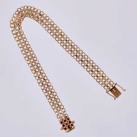 Armband x-länk, längd: ca 19cm, bredd: ca 8mm, Stockholms Ädelsmide Ab, år 1967, 18K Vikt: 8,8 g