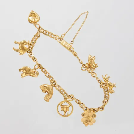 Armband Bismarck, åtta berlocker, skev, klämda länkar, defekt, 18K Vikt: 10,4 g