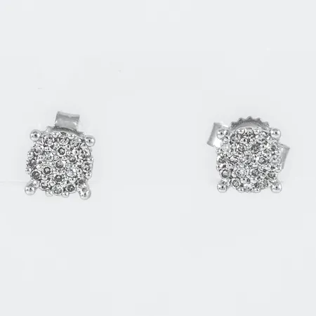 Örhängen i 18K vitguld med 38 x ca 0,005ct åttkantslipade diamanter, De är Ø 4,7 mm och väger 1,2g. Stämplad GHA, 750.