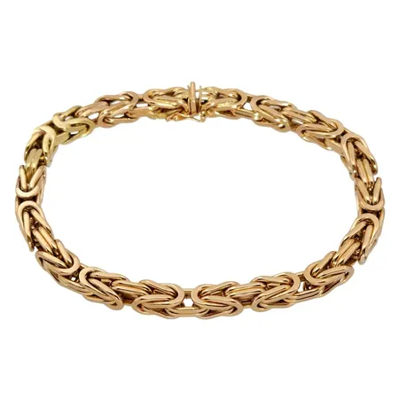 Armband Kejsarlänk, 18K guld, tillverkarstämpel NG, svensk kontrollstämpel, längd knäppt 23,0 cm, bredd 6 mm, tjocklek 6 mm, några lödningar / lagningar Vikt: 72 g