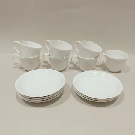 7 Kaffekoppar med fat, Dine, höjd 6cm, Ø7,5cm, fat Ø13cm, signerad Sweden Bone China, Gustavsberg,färgbortfall, bruksslitage. 