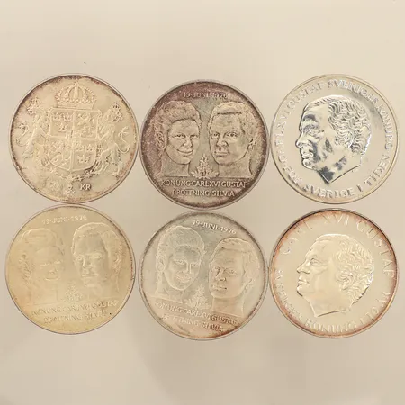 Fyra mynt, konung Carl XVI Gustaf drottning Silvia 19 Juni 1976 50kr, ett mynt Carl XVI Gustaf Sveriges konung i 10 år 1983 200kr, ett mynt Carl XVI Gustaf "För Sverige i tiden" 1980 200kr, silver 925/1000 Vikt: 161,5 g