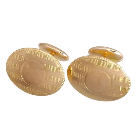 Manschettknappar, ett par, 10K guld, frontens storlek 14x20 mm Vikt: 5,4 g