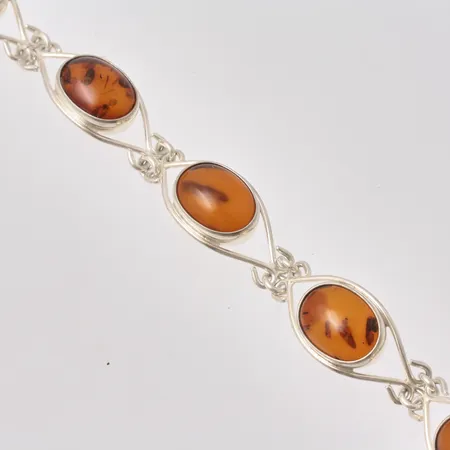 Armband i silver, 18cm, bredd 12,4mm, 925/1000, 6st bärnstenar, mått 10x13mm, vikt 12,82g.