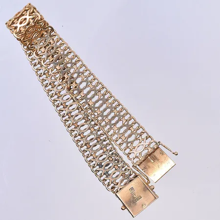 Armband, längd 19 cm, bredd 14 mm, 18K. Vikt: 25,4 g