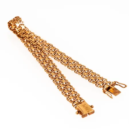 Defekt armband i 18K guld. Vikt: 14,4g. 
