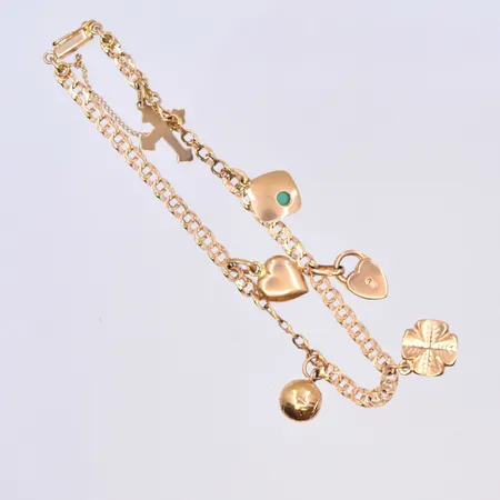 Armband Bismarck med berlocker, längd 19,5 cm, bredd länk 3 mm, 18K. Vikt: 7,3 g