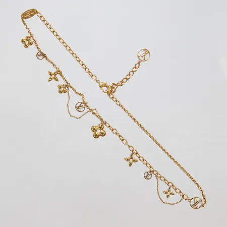 Collier, Louis Vuitton, Blooming, Supple Necklace, längd: 39-44,5cm, modellnr: M64855, serienr: OB0291, gulmetall, integrerade berlocker samt kedjedetaljer, smyckespouch, kvitto från Birger Jarlsgatan 2022.  Vikt: 0 g