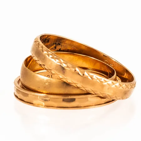 Graverat guld i 18K. Vikt: 11,2g. 