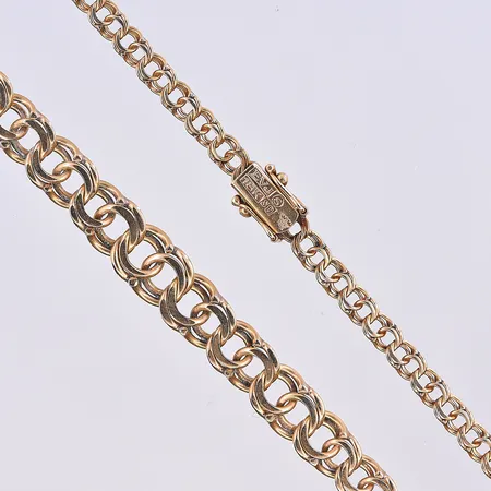 Collier Bismarck, doserad, bredd 4-7 mm, längd 45,5 cm, 18K. Vikt: 15 g