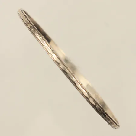 Armring med mönsterdekor, innermått ca 64mm, bredd ca 3mm, ca år 1974, silver  Vikt: 6,7 g