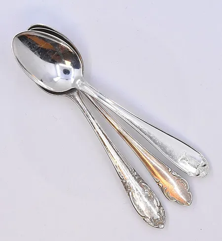 8 skedar, modell Vasa, Rådhus, Slottsbarock och Haga, längd 11-11,5 cm, silver 830/1000. Vikt: 91,3 g