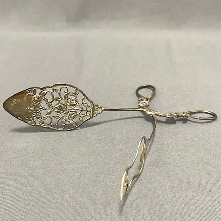 Kaktång, längd 19,5cm, silver 830/1000.  Vikt: 43,7 g