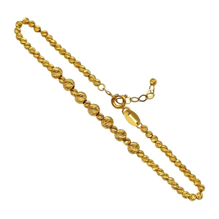 Armband, 21K guld, mönstrade klot, justerbar längd 17,0 - 19,5 cm, bredd 2,3 - 4 mm, fint skick Vikt: 5,1 g