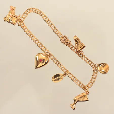 Armband Bismarck, sex berlocker, längd 19cm, bredd 3,9mm, Hildens Guldvaror, år 1963, 18K Vikt: 10,7 g