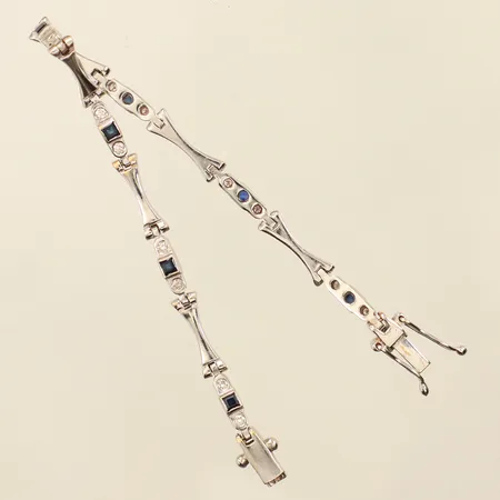 Armband, diamanter 14xca0,02ct, blå stenar, längd 16,5cm, bredd 1,5-3mm, vitguld, 18K  Vikt: 12,4 g
