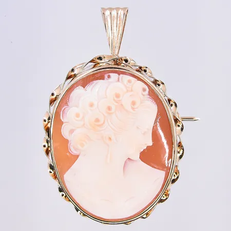 Hänge/brosch med Camé, längd 43 mm, bredd 26 mm, 18K. Vikt: 6,9 g