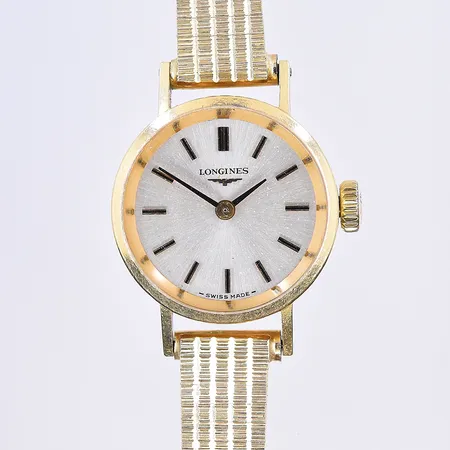 Damur Longines, manuell, Ø19 mm, graverad boett, 18K, stål klocklänk. Bruttovikt 20,8g.