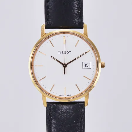 Herrur Tissot, quartz, datum, Ø ca 34mm, 18K, med läderband, brvikt: 27,6g