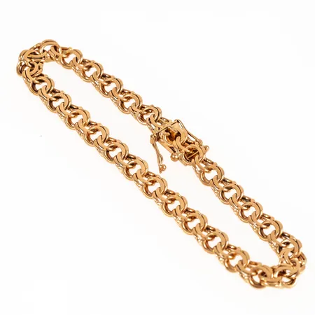 Armband, Bismarck i 18K guld. Det är 19,5 cm långt, 6,3 mm brett och väger 14,1g. 18K & kattfot. Defekt säkerhetsåtta. 