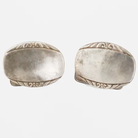 Ett par manschettknappar, 15x19,5mm, Guldvaruaktiebolaget G. Dahlgren & Co, Malmö 1943, 830/1000 silver. Vikt: 7,9 g