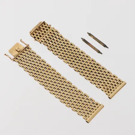 Armband till herrur, guldsmed Harry Hermansson AB Stockholm, längd ca 8+8.5 cm, bredd 16.3 mm, 18k. Vikt: 43,3 g