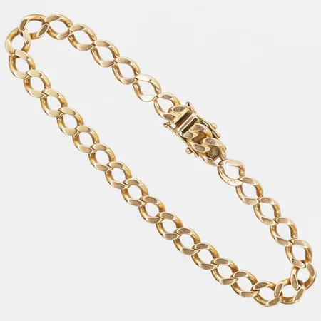 Armband Pansar, längd: 19,5cm, bredd: 6mm, bruksslitage, 18K guld.  Vikt: 18,6 g