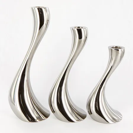 Tre Ljusstakar Cobra, Constantin Wortmann för Georg Jensen, höjd 16cm, 20cm samt 24cm, polerat rostfritt stål, smärre bruksslitage, inga tillbehör,  Skickas med postpaket.