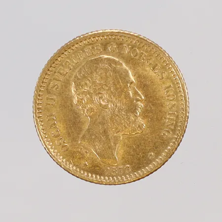 Mynt 10 kronor Oscar II 1873 Ø18mm, 21,6K (900/1000)  Vikt: 4,5 g