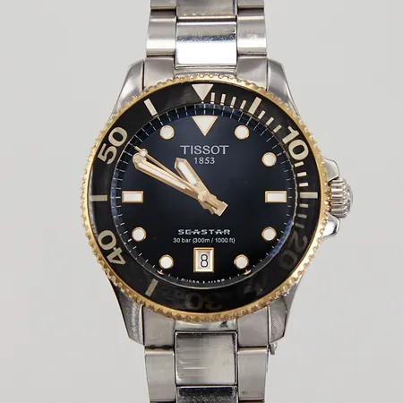 Damur Tissot, Seastar 1000, Ø36mm, quartz, datum, ref.nr. T120.210.21.051.00, serienummer: 9SNLA2DPA, stållänk ca 19cm, svart urtavla, mindre repor på  antireflexbehandling, bruksskick, inga tillbehör.