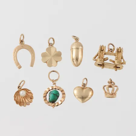Berlocker 8 st, 14k. Vikt: 8,7 g