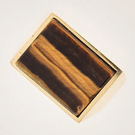 Ring med tigeröga, stl 19¼, bredd 4-13mm, sten med nagg, 18K  Vikt: 11,1 g