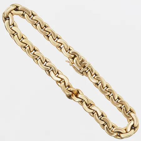 Armband, ihåligt, längd. 20cm, bredd: 6mm, smärre bruksslitage, 18K guld.  Vikt: 14,4 g