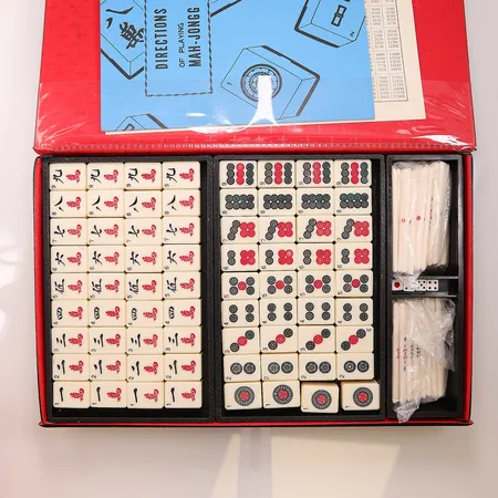 Mahjongspel, manual. Skickas med postpaket.