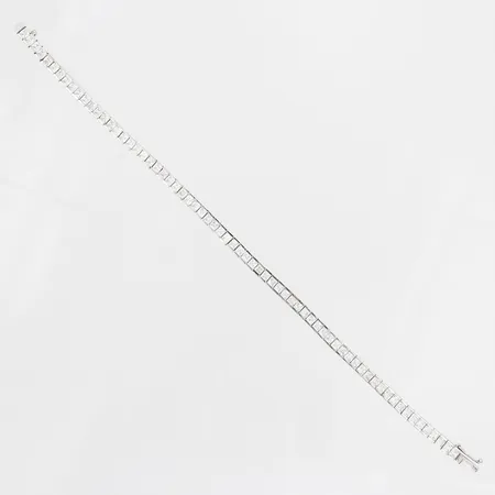 Armband med vita stenar, längd 18,5cm, bredd 3mm, 18K vitguld Vikt: 12,2 g