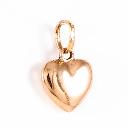 Hänge "hjärta" i 18K guld. Det är 14,5 mm långt inkl. ögla och väger 0,5g.