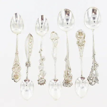 7 kaffeskedar Svenska Floran, 5st 100mm, 2st 112mm,  GEWE, silver 830/1000. Vikt: 73,1 g