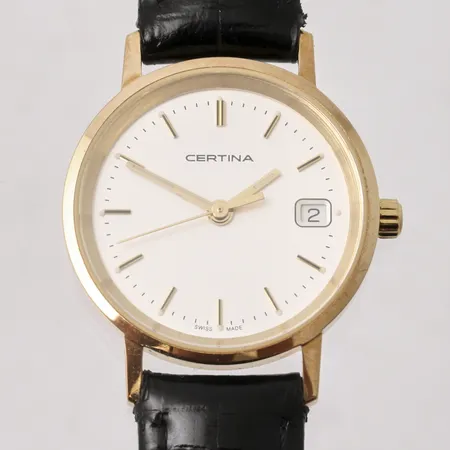 Damur Certina i 14K guld, Ø24mm, boett-nr EOL 152.9289.65, gravyr på boett Strålfors, etui fint skick.