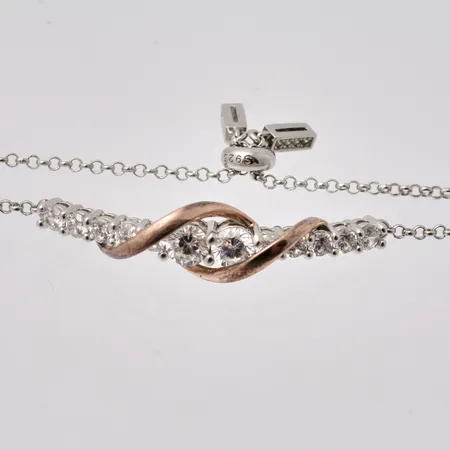 Armband i silver och koppar, 15-24cm, Ärtlänk, bredd 1,8-9,6mm, 12st vita stenar, mått 10st Ø3mm, 2st Ø5mm, tillverkad av Jeulia, etui, vikt 6,38g.