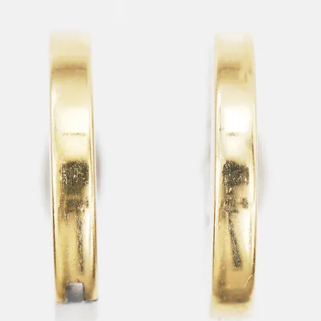 Ett par örhängen, creoler, Ø18mm, bredd: 3mm, tvåfärgad, bruksslitage, 18K guld.  Vikt: 7,9 g