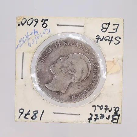 Mynt 2 Kronor 1876 Oscar II, Ø31mm, sällsynt samlarmynt s.k. "Brett årtal, Stort E.B", med slitage, silver 800/1000 Vikt: 14,7 g
